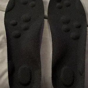 Black top surface with cushioning zones