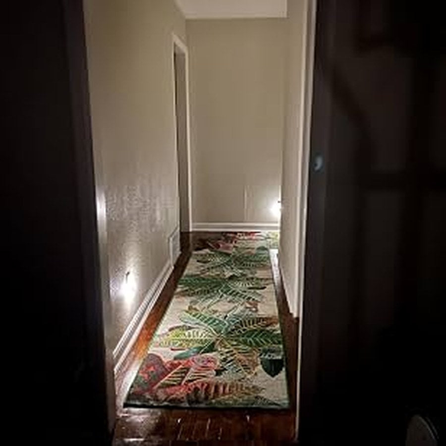 Warm white square night lights in a hallway