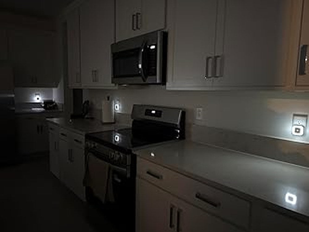 Warm white square night lights used along a kitchen counter