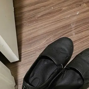 Black cloud cushion insoles installed inside everyday shoes