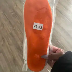 Orange insole with 41–42 size label